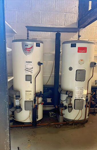 https://balcattahotwater.com.au/uploads/2025/06/electric-hot-water-system-10198.jpg